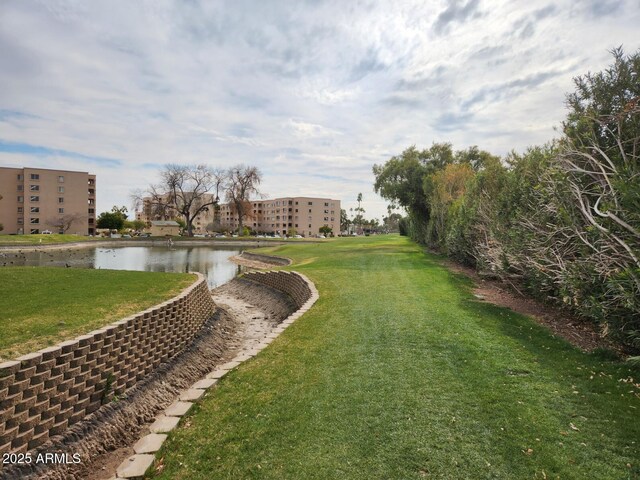 view of yard with a water view