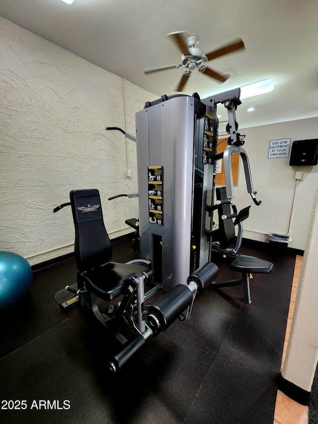 gym with a ceiling fan