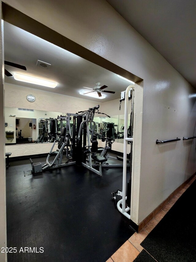 workout area with visible vents and a ceiling fan