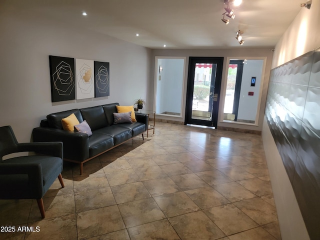 tiled living area with recessed lighting