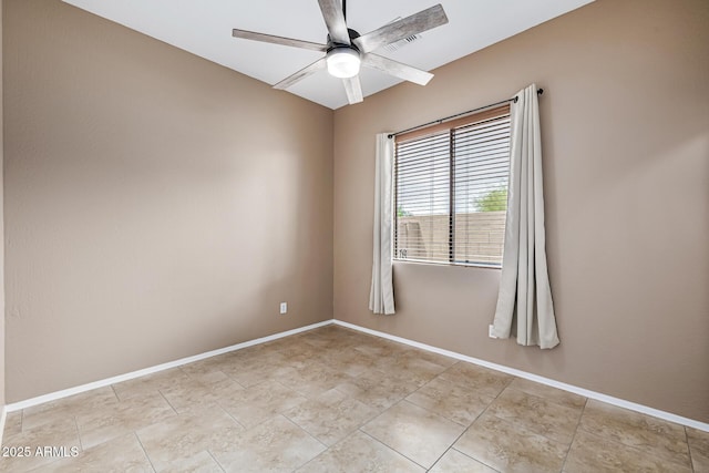 unfurnished room featuring baseboards, ceiling fan, and visible vents