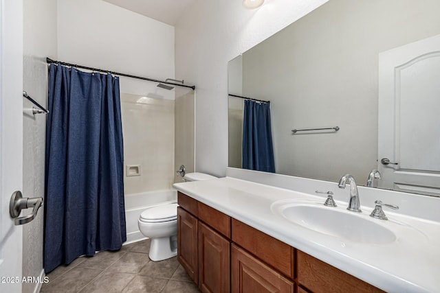 bathroom with shower / bath combination with curtain, tile patterned flooring, vanity, and toilet