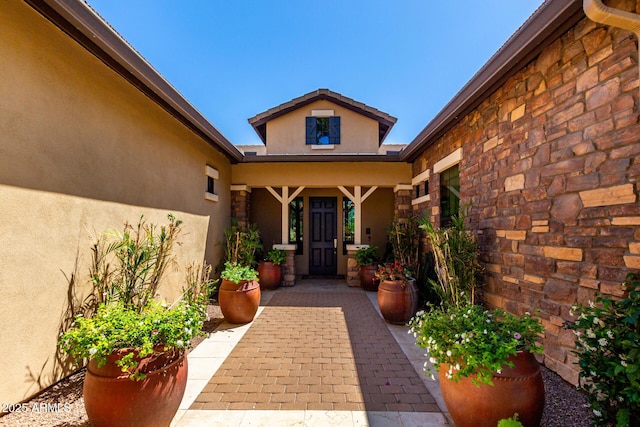 17673 E Bronco Dr, Queen Creek, AZ 85142 - property entrance with stone siding and stucco siding