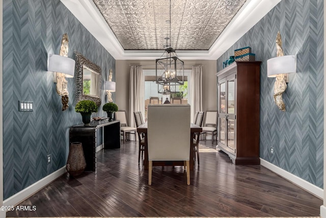 17673 E Bronco Dr, Queen Creek, AZ 85142 - dining room featuring a chandelier, wallpapered walls, an accent wall, and baseboards