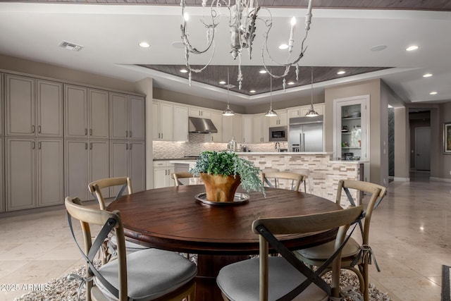 17673 E Bronco Dr, Queen Creek, AZ 85142 - dining area featuring recessed lighting, an inviting chandelier, visible vents, and a raised ceiling