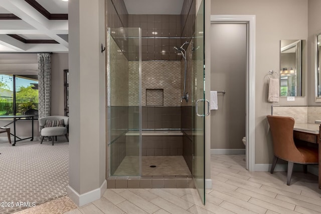 17673 E Bronco Dr, Queen Creek, AZ 85142 - bathroom featuring a stall shower, coffered ceiling, baseboards, toilet, and beam ceiling