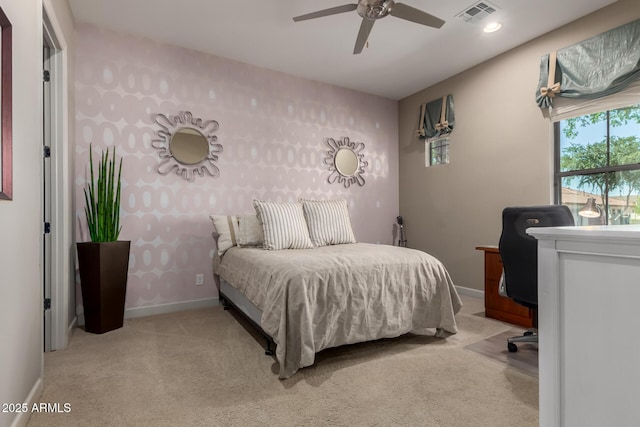 17673 E Bronco Dr, Queen Creek, AZ 85142 - bedroom with baseboards, visible vents, a ceiling fan, and light colored carpet
