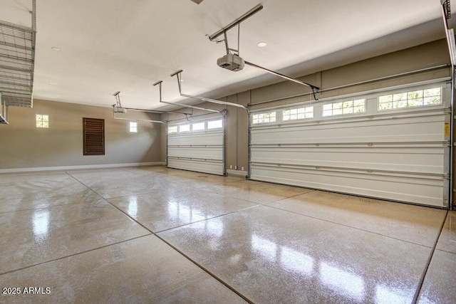 17673 E Bronco Dr, Queen Creek, AZ 85142 - garage featuring baseboards and a garage door opener