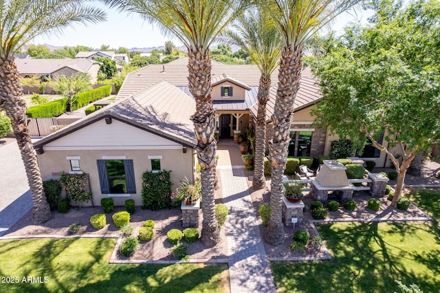 17673 E Bronco Dr, Queen Creek, AZ 85142 - view of front facade featuring a front yard and stucco siding