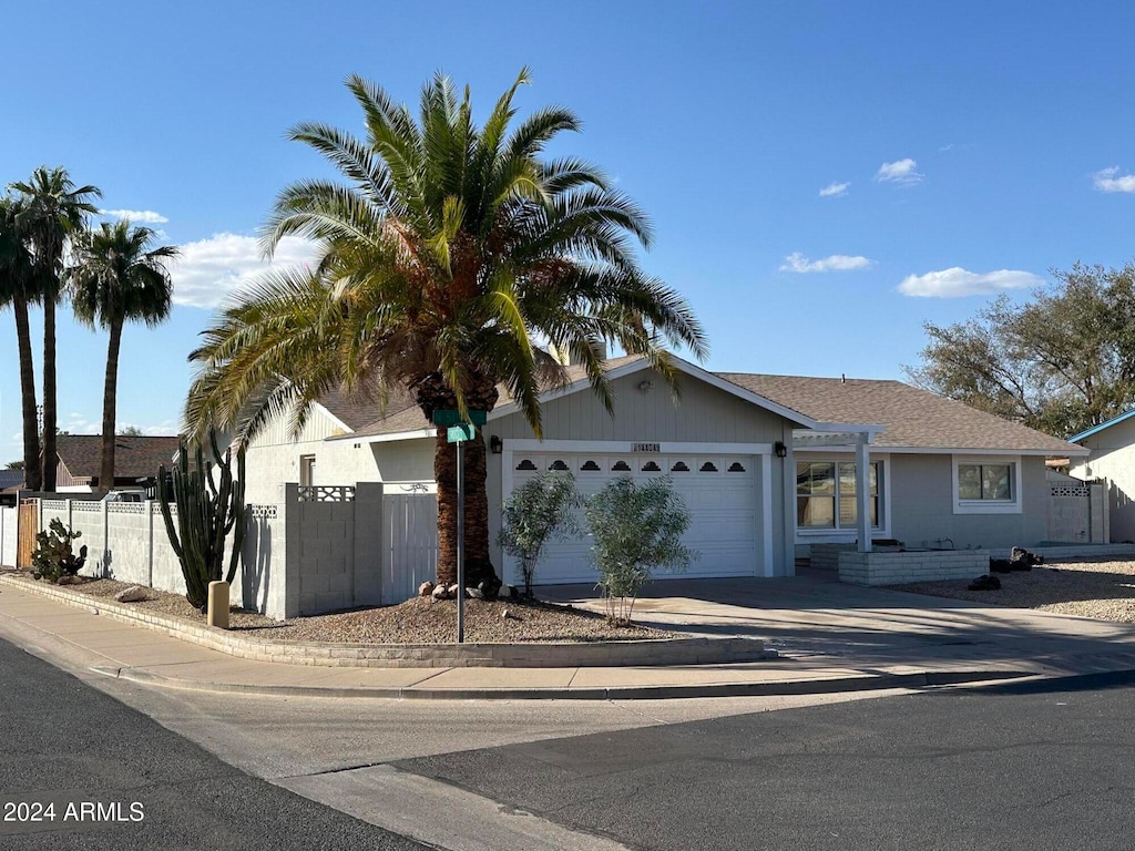 view of front of property with a garage