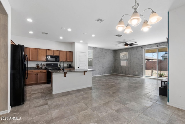 5429 W Chuck Box Rd, Laveen, AZ 85339 - kitchen with black appliances, baseboards, recessed lighting, a chandelier, and ceiling fan