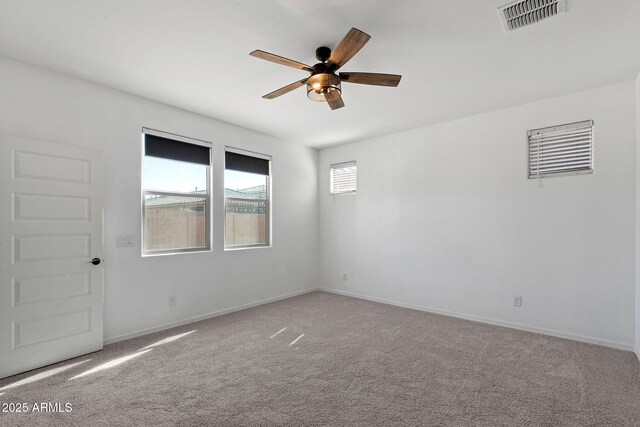 5429 W Chuck Box Rd, Laveen, AZ 85339 - empty room featuring a ceiling fan, carpet, and baseboards