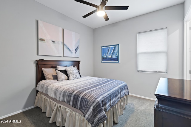 bedroom featuring baseboards, a ceiling fan, and carpet flooring