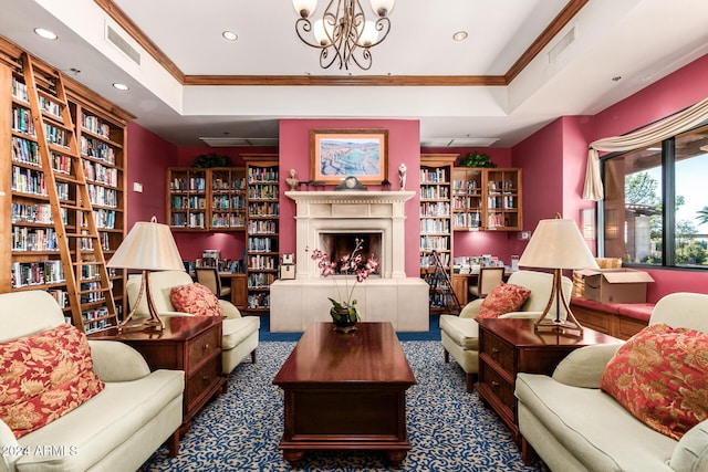 carpeted living room featuring ornamental molding, a chandelier, and a raised ceiling