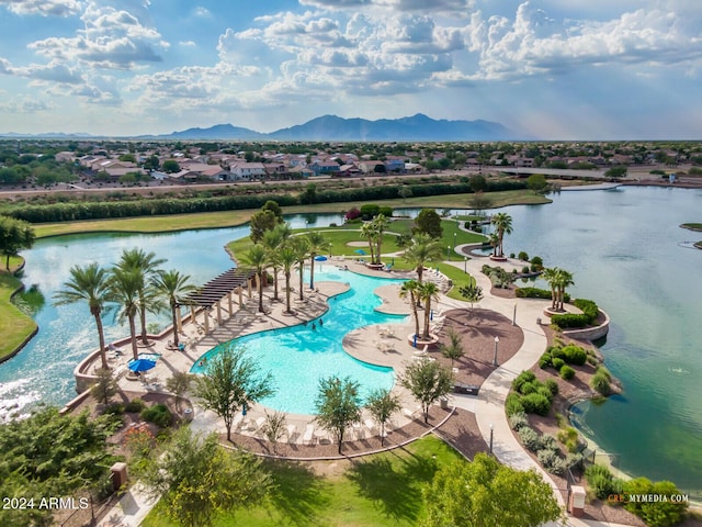 aerial view featuring a water and mountain view