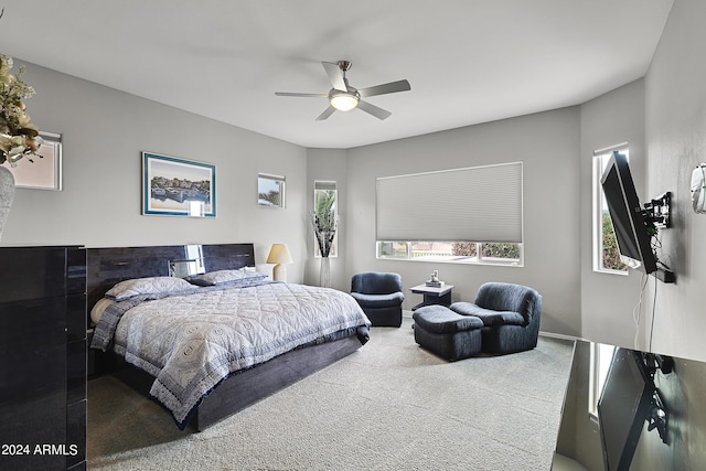 bedroom with carpet floors and a ceiling fan