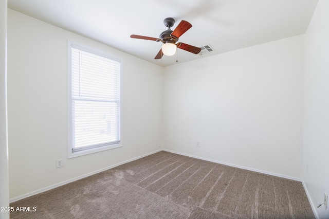 5749 S 21st Ter, Phoenix, AZ 85040 - unfurnished room featuring carpet, ceiling fan, and baseboards