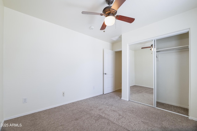 5749 S 21st Ter, Phoenix, AZ 85040 - unfurnished bedroom featuring carpet flooring, a closet, a ceiling fan, and baseboards