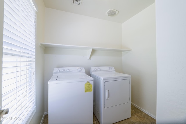 5749 S 21st Ter, Phoenix, AZ 85040 - laundry room featuring separate washer and dryer and baseboards