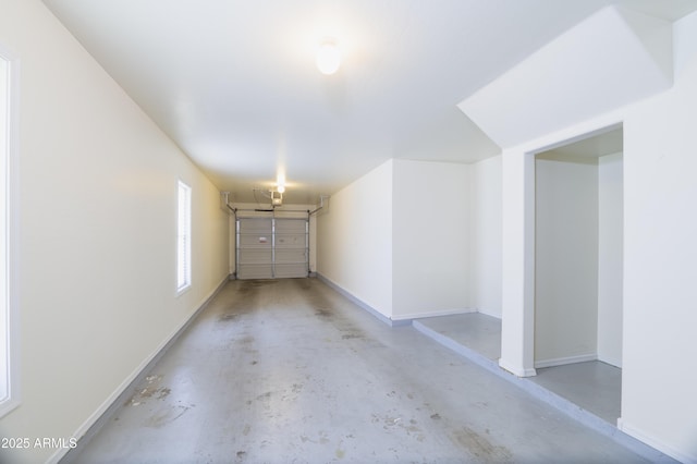 5749 S 21st Ter, Phoenix, AZ 85040 - garage featuring baseboards