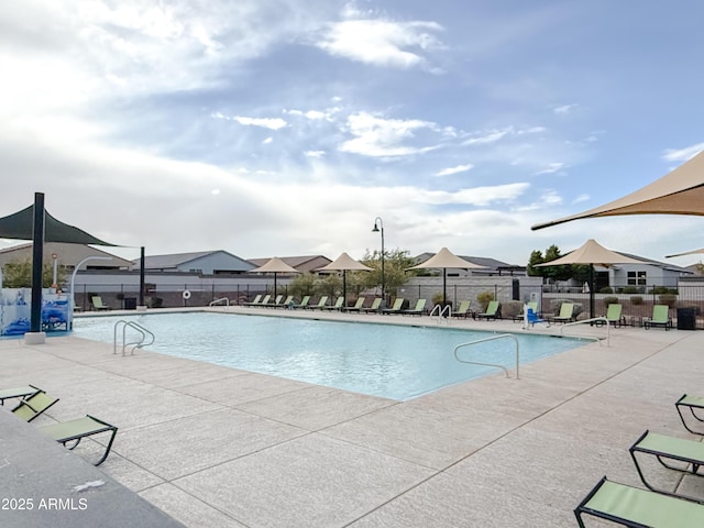 view of swimming pool with a patio