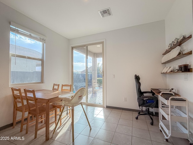 dining room featuring light tile patterned floors