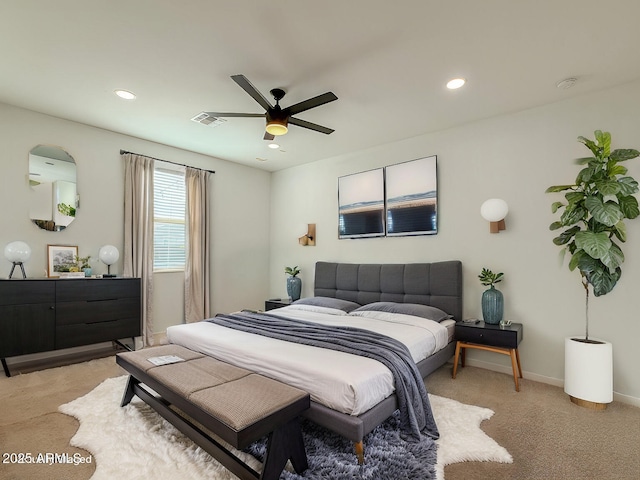 carpeted bedroom with ceiling fan