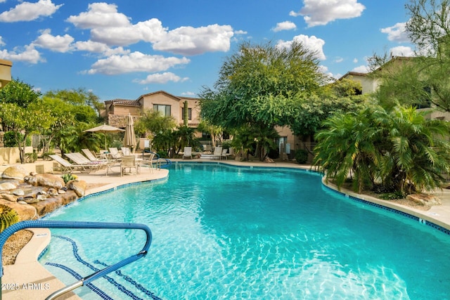 community pool with a patio