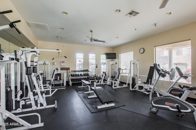 workout area featuring visible vents, recessed lighting, and a ceiling fan