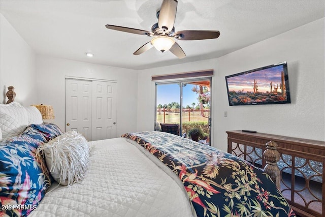 bedroom featuring a closet, access to exterior, and ceiling fan