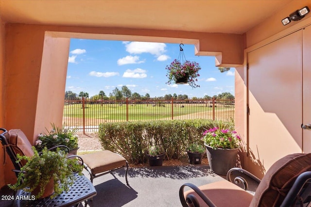 view of patio with a rural view