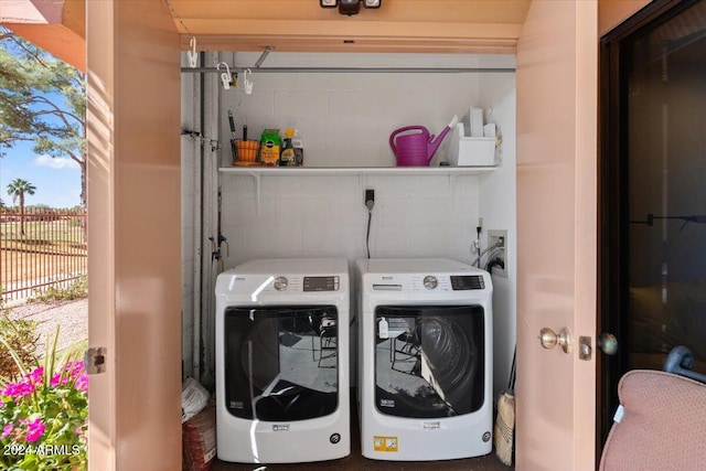 laundry area featuring washer and clothes dryer