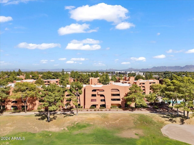 birds eye view of property featuring a mountain view