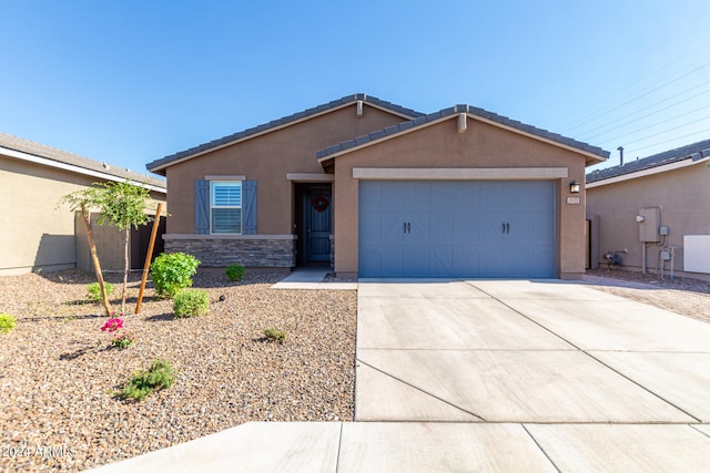 ranch-style home with a garage