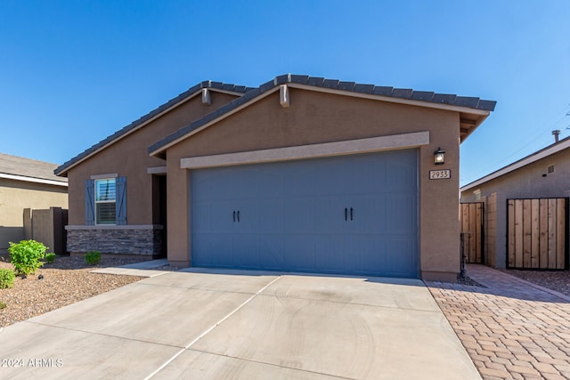 view of front of property featuring a garage