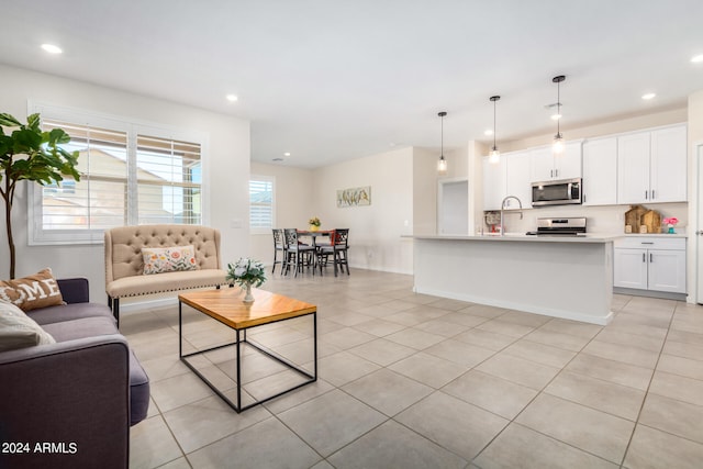 living room with light tile patterned flooring