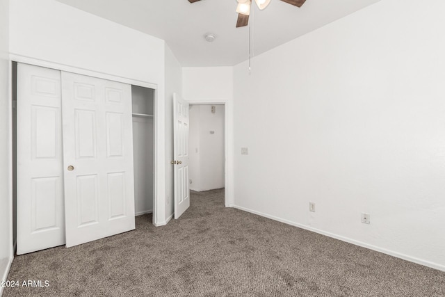 unfurnished bedroom with carpet flooring, ceiling fan, and a closet