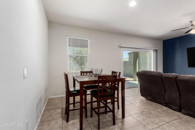 36454 W Picasso St, Maricopa, AZ 85138 - dining area featuring a ceiling fan, healthy amount of natural light, light tile patterned floors, and baseboards