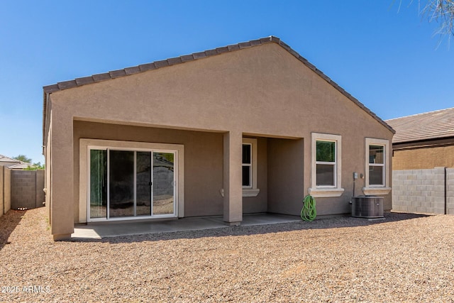 36454 W Picasso St, Maricopa, AZ 85138 - back of house featuring stucco siding, a fenced backyard, a patio, and central air condition unit