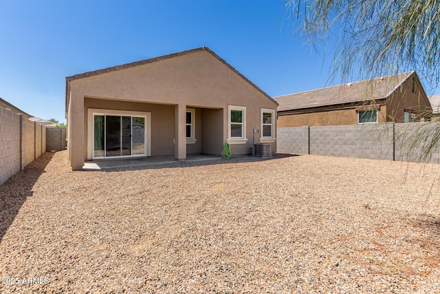 36454 W Picasso St, Maricopa, AZ 85138 - rear view of house featuring stucco siding, a fenced backyard, central air condition unit, and a patio area