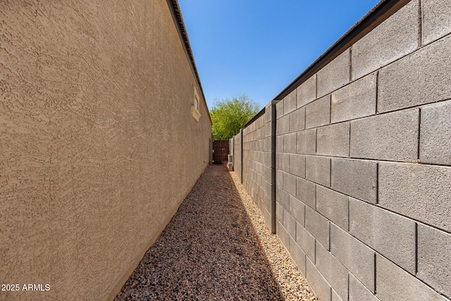 36454 W Picasso St, Maricopa, AZ 85138 - view of side of home featuring fence and stucco siding