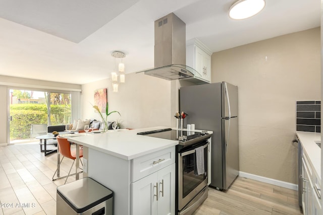 kitchen with exhaust hood, light hardwood / wood-style flooring, white cabinets, stainless steel electric range oven, and hanging light fixtures