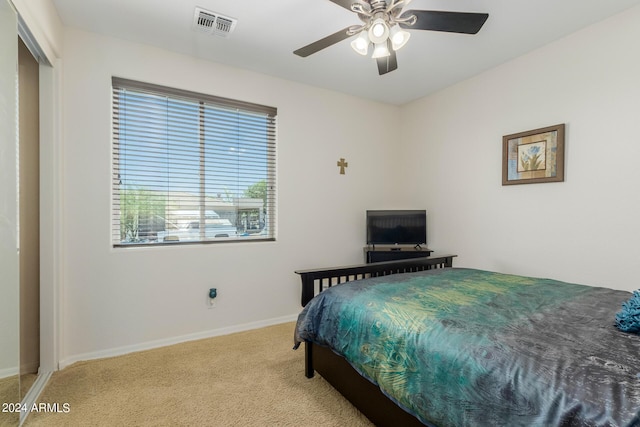 carpeted bedroom featuring ceiling fan