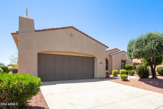 view of front of home with a garage