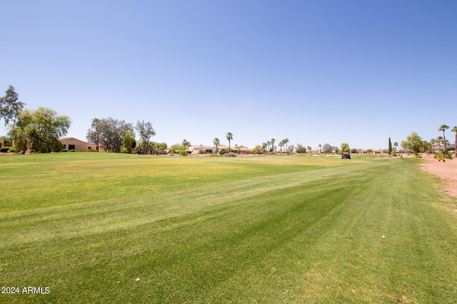 surrounding community featuring a lawn