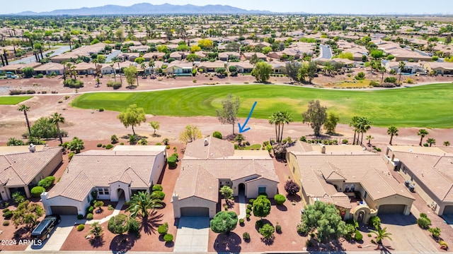 birds eye view of property featuring a mountain view