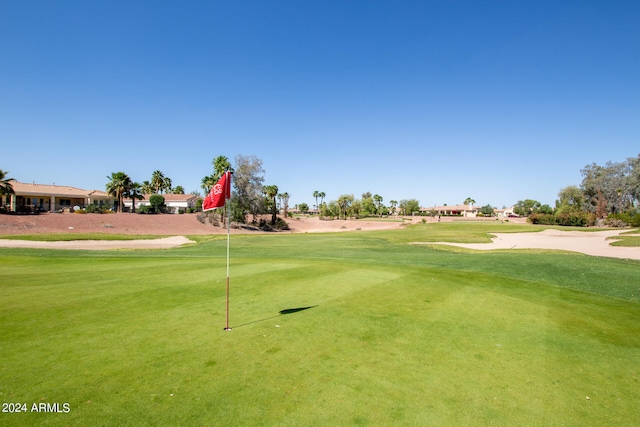 surrounding community featuring a lawn