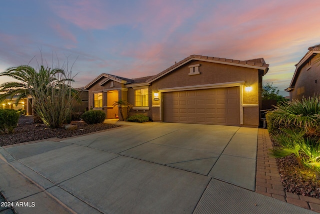 single story home featuring a garage