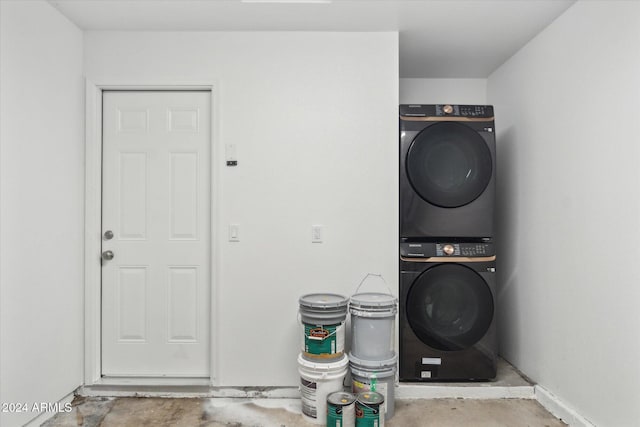 washroom with stacked washer and dryer