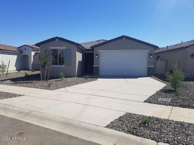 view of front of property with a garage